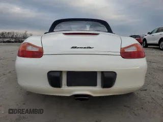 2000 Porsche Boxster z VIN WP0CA2980YU622861, wystawiony jako Copart lot #78993794 z przebiegiem 129 631 mil mil oraz Czysty tytuł • Clean title. Historia ofert i sprzedaży dostępna na DreamBid. Obrazek 6.