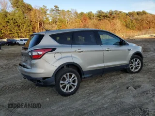 2017 Ford Escape SE with VIN 1FMCU0GD8HUD73233, listed as a Copart auction lot 80984074 with 68,989 mi miles and Salvage Title. Bid and sale history available at carsss.com. Image 3.