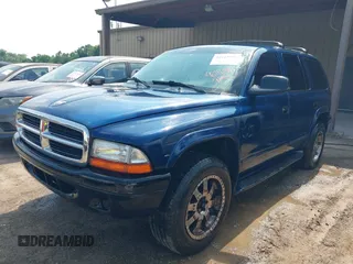 2003 Dodge Durango SLT z VIN 1D4HS48N33F540550, wystawiony jako IAAI lot #42413911 z przebiegiem 309 084 mil mil oraz . Historia ofert i sprzedaży dostępna na DreamBid. Obrazek 2.