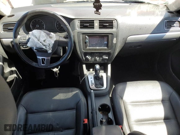2013 Volkswagen Jetta SE with VIN 3VWDP7AJ6DM401761, listed as a Copart auction lot 52921765 with 119,847 mi miles and Salvage title. Bid and sale history available at DreamBid. Image 8.