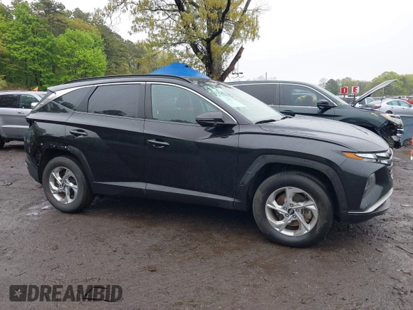 2022 Hyundai Tucson SEL z VIN 5NMJBCAE9NH015906, wystawiony jako IAAI lot #42169136 z przebiegiem 28 009 mil mil oraz . Historia ofert i sprzedaży dostępna na DreamBid. Obrazek 13.