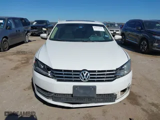 2014 Volkswagen Passat TDI SE w/Sunroof with VIN 1VWBN7A32EC016554, listed as a IAAI auction lot 41472156 with 178,149 mi miles. Bid and sale history available at carsss.com. Image 12.