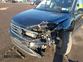 2023 Volkswagen Tiguan SE with VIN 3VVMB7AX8PM032557, listed as a IAAI auction lot 41585975 with 28,706 mi miles and . Bid and sale history available at DreamBid. Image 6.