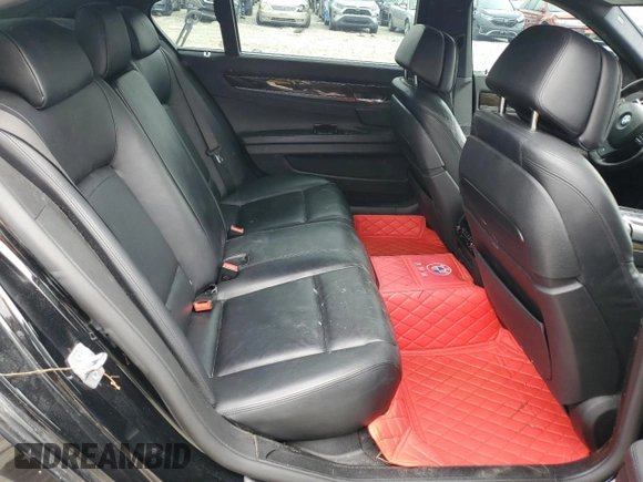 2013 BMW 7 Series 750Li xDrive с VIN WBAYF8C58DD141496, выставлен на аукционе Copart как лот 49923365 с пробегом 141 620 миль миль и Чистый • Clean title. История ставок и продаж доступна на DreamBid. Изображение 10.