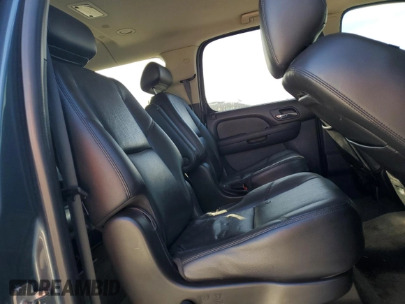 2010 Chevrolet Suburban LTZ with VIN 1GNUKKE37AR165641, listed as a Copart auction lot 88939935 with 203,190 mi miles and Salvage title. Bid and sale history available at DreamBid. Image 12.
