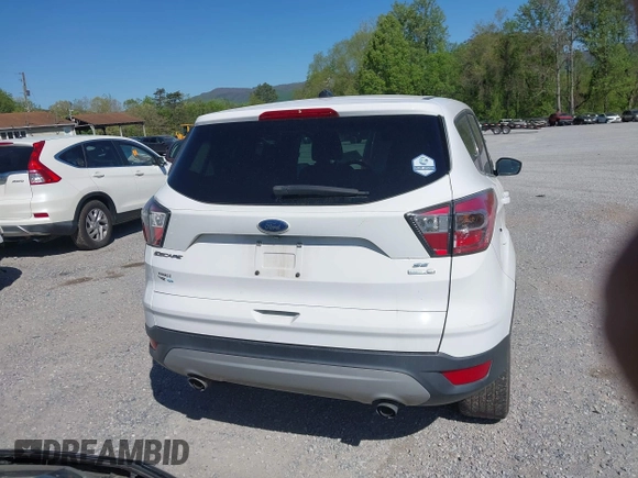 2017 Ford Escape SE with VIN 1FMCU9GD3HUA40233, listed as a IAAI auction lot 42126271 with 284,937 mi miles. Bid and sale history available at carsss.com. Image 17.