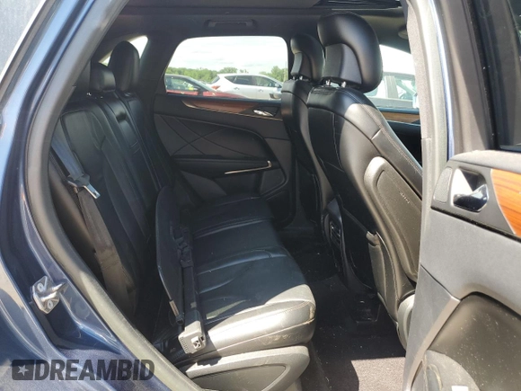 2018 Lincoln MKC Select with VIN 5LMCJ2D9XJUL29144, listed as a Copart auction lot 58049705 with 35,695 mi miles and Salvage title. Bid and sale history available at DreamBid. Image 11.