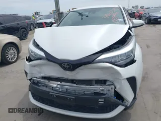 2022 Toyota C-HR XLE z VIN NMTKHMBX2NR144638, wystawiony jako IAAI lot #42063325 z przebiegiem 22 823 mil mil oraz . Historia ofert i sprzedaży dostępna na DreamBid. Obrazek 12.