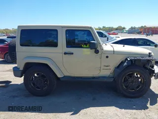 2011 Jeep Wrangler Sahara with VIN 1J4AA5D13BL562732, listed as a IAAI auction lot 41838520 with 148,359 mi miles and . Bid and sale history available at DreamBid. Image 14.