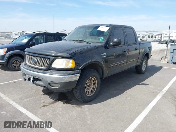 2003 Ford F-150 XLT with VIN 1FTRW08L83KA14760, listed as a IAAI auction lot 41820943 with 215,130 mi miles. Bid and sale history available at carsss.com. Image 19.