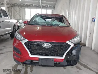 2021 Hyundai Tucson Value with VIN KM8J33A44MU363524, listed as a IAAI auction lot 41854508 with 59,821 mi miles. Bid and sale history available at carsss.com. Image 12.