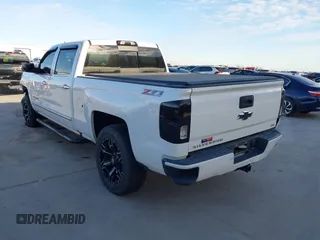 2016 Chevrolet Silverado 1500 LTZ with VIN 3GCUKSEJ0GG221628, listed as a IAAI auction lot 41276045 with 153,476 mi miles. Bid and sale history available at carsss.com. Image 3.