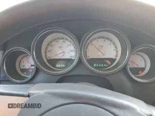 2008 Dodge Charger z VIN 2B3KA43R88H277706, wystawiony jako Copart lot #54357955 z przebiegiem 158 458 mil mil oraz Szkoda całkowita • Salvage title. Historia ofert i sprzedaży dostępna na DreamBid. Obrazek 9.