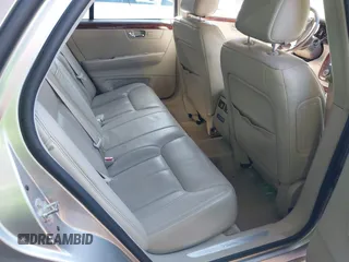 2006 Cadillac DTS w/1SC with VIN 1G6KD57Y46U165978, listed as a IAAI auction lot 41854728 with 116,455 mi miles. Bid and sale history available at carsss.com. Image 8.