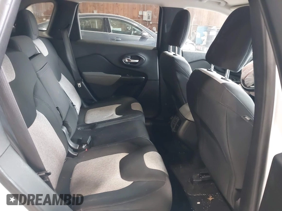 2014 Jeep Cherokee Altitude with VIN 1C4PJMCB7EW186432, listed as a IAAI auction lot 42076018 with 150,186 mi miles and . Bid and sale history available at DreamBid. Image 8.