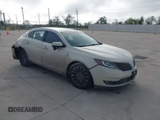 2015 Lincoln MKS with VIN 1LNHL9DKXFG607951, listed as a IAAI auction lot 40807752 with 207,097 mi miles. Bid and sale history available at carsss.com. Image 1.