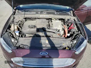2013 Ford Fusion SE Hybrid z VIN 3FA6P0LU6DR365363, wystawiony jako Copart lot #62325625 z przebiegiem 226 624 mil mil oraz Czysty tytuł • Clean title. Historia ofert i sprzedaży dostępna na DreamBid. Obrazek 11.