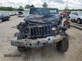 2012 Jeep Wrangler Unlimited Sport z VIN 1C4BJWDG4CL243538, wystawiony jako Copart lot #58826675 z przebiegiem 126 646 mil mil oraz Szkoda całkowita • Salvage title. Historia ofert i sprzedaży dostępna na DreamBid. Obrazek 5.