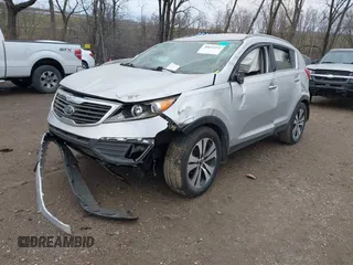 2011 Kia Sportage EX with VIN KNDPC3A25B7051396, listed as a IAAI auction lot 38855292 with 263,407 mi miles and . Bid and sale history available at DreamBid. Image 2.