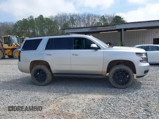 2016 Chevrolet Tahoe LS with VIN 1GNSCAKC5GR354722, listed as a IAAI auction lot 41812839 with 146,533 mi miles and . Bid and sale history available at DreamBid. Image 13.