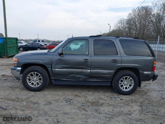 2002 GMC Yukon SLT with VIN 1GKEC13ZX2J217778, listed as a IAAI auction lot 41469912 with 293,497 mi miles. Bid and sale history available at carsss.com. Image 6.