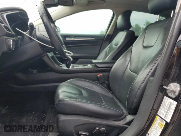 2019 Ford Fusion Titanium z VIN 3FA6P0RU4KR211674, wystawiony jako Copart lot #62205885 z przebiegiem 313 261 mil mil oraz Szkoda całkowita • Salvage title. Historia ofert i sprzedaży dostępna na DreamBid. Obrazek 7.