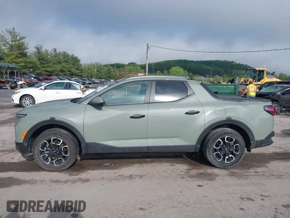 2022 Hyundai Santa Cruz SEL z VIN 5NTJCDAE8NH024149, wystawiony jako IAAI lot #42197663 z przebiegiem 51 491 mil mil oraz . Historia ofert i sprzedaży dostępna na DreamBid. Obrazek 14.