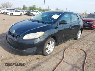 2009 Toyota Matrix with VIN 2T1KU40E69C091858, listed as a IAAI auction lot 41925490 with 153,161 mi miles. Bid and sale history available at carsss.com. Image 17.