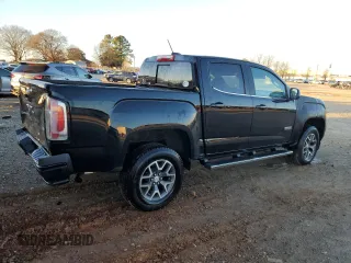 2016 GMC Canyon 2WD SLE with VIN 1GTG5CE33G1386325, listed as a Copart auction lot 86988134 with 91,610 mi miles and Salvage Title. Bid and sale history available at carsss.com. Image 3.