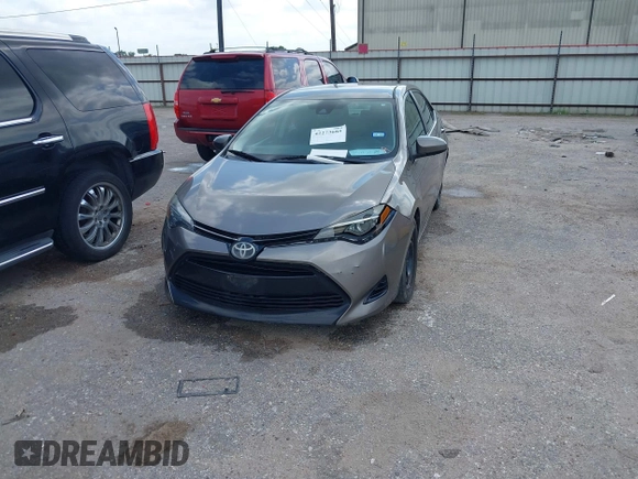 2018 Toyota Corolla L z VIN 5YFBURHE1JP855556, wystawiony jako IAAI lot #42273685 z przebiegiem 165 792 mil mil oraz . Historia ofert i sprzedaży dostępna na DreamBid. Obrazek 17.