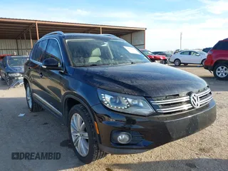 2016 Volkswagen Tiguan SE z VIN WVGAV7AX8GW506494, wystawiony jako IAAI lot #41352487 z przebiegiem 91 247 mil mil oraz . Historia ofert i sprzedaży dostępna na DreamBid. Obrazek 1.