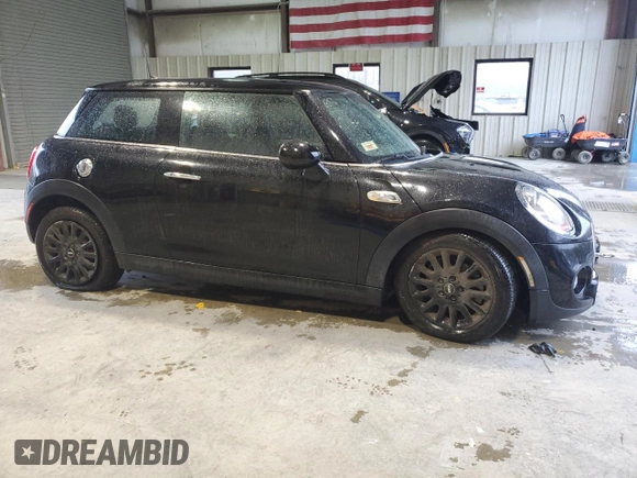 2017 MINI Hardtop Cooper S with VIN WMWXP7C50H3C61844, listed as a Copart auction lot 52209495 with 54,990 mi miles and Salvage Title. Bid and sale history available at DreamBid. Image 4.