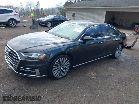 2019 Audi A8 L with VIN WAU8DAF84KN019115, listed as a IAAI auction lot 41856931 with 84,387 mi miles. Bid and sale history available at carsss.com. Image 2.