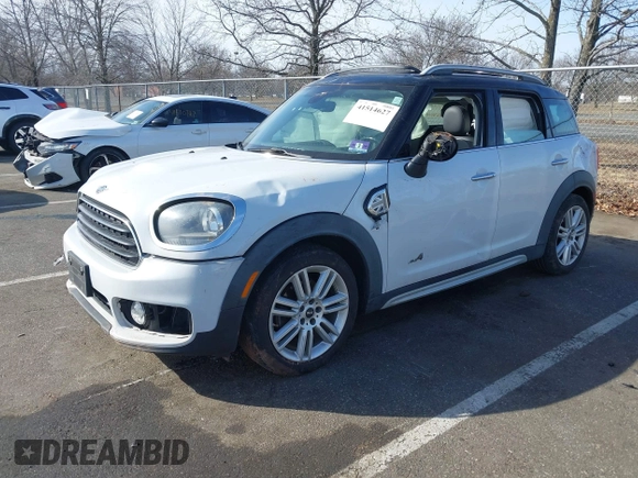 2019 MINI Countryman Cooper with VIN WMZYV5C55K3E05106, listed as a IAAI auction lot 41514627 with 69,399 mi miles. Bid and sale history available at carsss.com. Image 18.