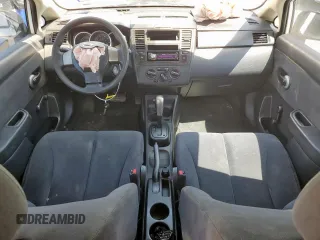 2010 Nissan Versa 1.6 with VIN 3N1CC1AP5AL403629, listed as a Copart auction lot 58264865 with 86,399 mi miles and Salvage title. Bid and sale history available at DreamBid. Image 8.
