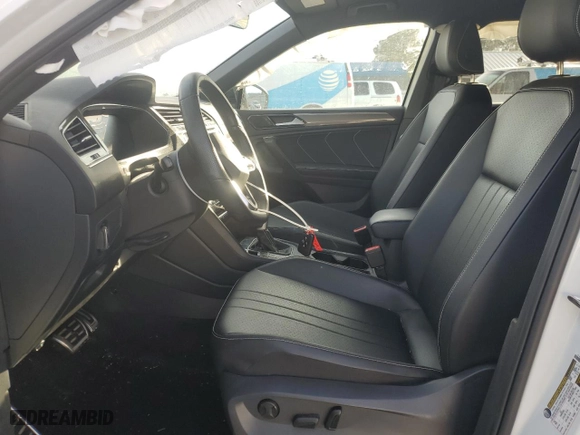 2023 Volkswagen Tiguan SE R-Line Black with VIN 3VVCB7AX8PM121086, listed as a Copart auction lot 45601555 with 27,571 mi miles and Salvage Title. Bid and sale history available at carsss.com. Image 7.
