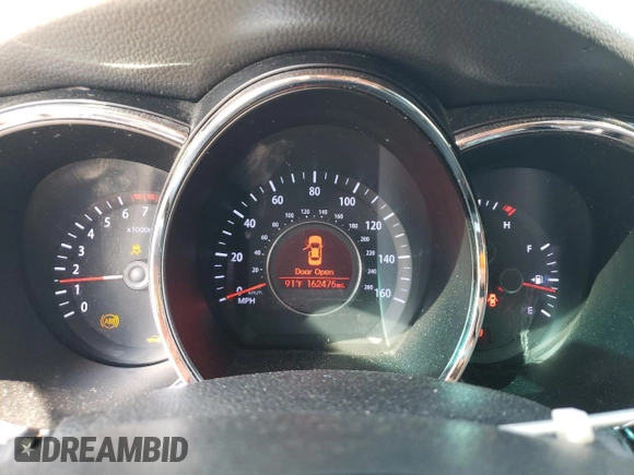 2013 Kia Optima EX с VIN 5XXGN4A77DG108218, выставлен на аукционе Copart как лот 57728815 с пробегом 162 475 миль миль и Списание • Salvage title. История ставок и продаж доступна на DreamBid. Изображение 9.