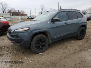 2014 Jeep Cherokee Trailhawk z VIN 1C4PJMBS8EW239981, wystawiony jako Copart lot #80226054 z przebiegiem 161 750 mil mil oraz Tytuł czysty. Historia ofert i sprzedaży dostępna na DreamBid. Obrazek 1.