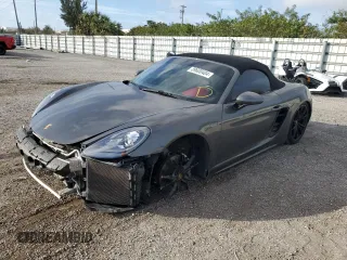 2017 Porsche 718 Boxster z VIN WP0CA2A8XHS221955, wystawiony jako Copart lot #39600404 z przebiegiem 52 979 mil mil oraz . Historia ofert i sprzedaży dostępna na DreamBid. Obrazek 1.
