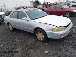1996 Toyota Camry LE with VIN 4T1BF12K1TU137601, listed as a IAAI auction lot 41450809 with 249,702 mi miles and . Bid and sale history available at DreamBid. Image 1.