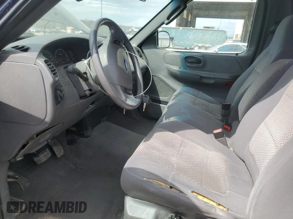 2004 Ford F-150 XL with VIN 2FTRF18W14CA74904, listed as a Copart auction lot 50361935 with 163,684 mi miles and Salvage title. Bid and sale history available at DreamBid. Image 7.