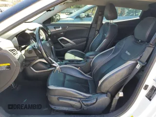2015 Hyundai Veloster Turbo with VIN KMHTC6AE6FU238983, listed as a Copart auction lot 49506085 with 122,909 mi miles and Salvage title. Bid and sale history available at DreamBid. Image 7.