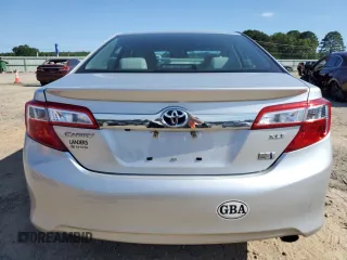 2012 Toyota Camry XLE z VIN 4T1BD1FK6CU010214, wystawiony jako Copart lot #57690544 z przebiegiem 77 943 mil mil oraz Szkoda całkowita • Salvage title. Historia ofert i sprzedaży dostępna na DreamBid. Obrazek 6.