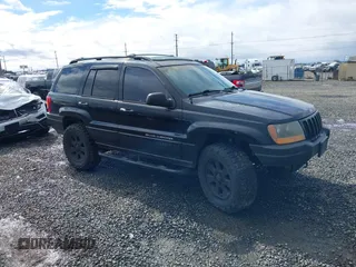 2001 Jeep Grand Cherokee Laredo with VIN 1J4GW48N61C642351, listed as a IAAI auction lot 41783127 with 194,578 mi miles and . Bid and sale history available at DreamBid. Image 1.