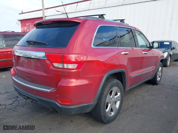 2011 Jeep Grand Cherokee Limited with VIN 1J4RR5GG1BC502105, listed as a IAAI auction lot 42024930 with 156,262 mi miles. Bid and sale history available at carsss.com. Image 4.