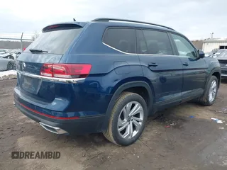 2021 Volkswagen Atlas SE with VIN 1V2JP2CA1MC548186, listed as a IAAI auction lot 41209054 with 99,071 mi miles and . Bid and sale history available at DreamBid. Image 4.