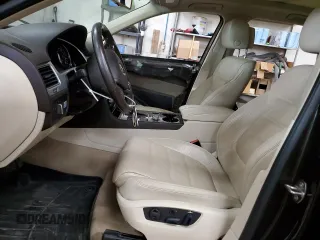 2016 Volkswagen Touareg Sport z VIN WVGEP9BPXGD006774, wystawiony jako Copart lot #56045495 z przebiegiem 85 695 mil mil oraz Szkoda całkowita • Salvage title. Historia ofert i sprzedaży dostępna na DreamBid. Obrazek 7.