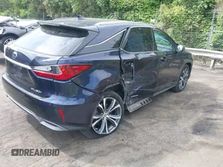 2017 Lexus RX 450h with VIN 2T2BGMCA8HC015536, listed as a IAAI auction lot 42130137 with 110,842 mi miles and . Bid and sale history available at DreamBid. Image 4.