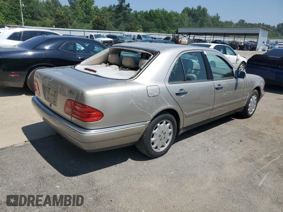 1999 Mercedes-Benz E-Class with VIN WDBJF65H2XA796208, listed as a Copart auction lot 62738904 with 156,283 mi miles and Salvage Title. Bid and sale history available at carsss.com. Image 3.