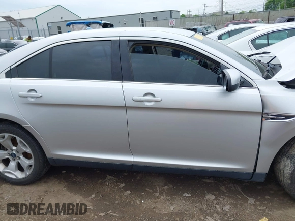 2012 Ford Taurus SEL z VIN 1FAHP2EW1CG132855, wystawiony jako IAAI lot #42256022 z przebiegiem 177 749 mil mil oraz . Historia ofert i sprzedaży dostępna na DreamBid. Obrazek 13.